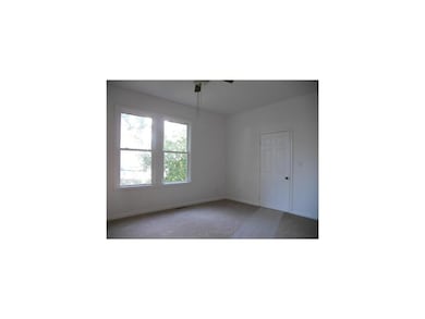 Dining Area. Formal dining room with new carpet an