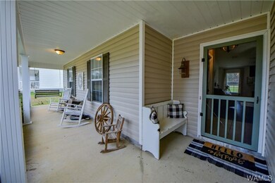 This is a front porch.  Plenty of room to add a few more rocking chairs.  And a swing on the end.