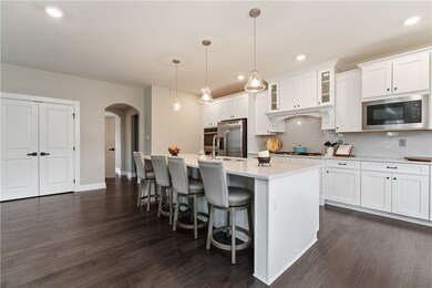 Another view of the kitchen showing the pantry and