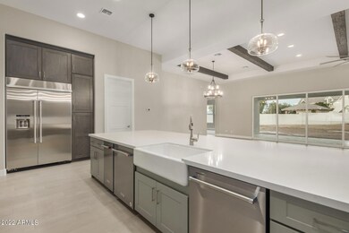Apron front sink