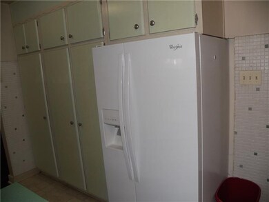 Check out this great wall of pantry cabinets with 