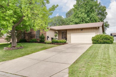 Nice long concrete driveway and 2 car oversized ga
