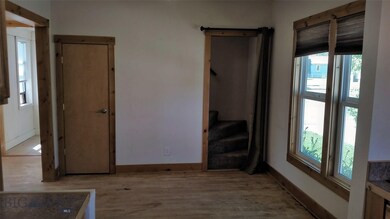 Dining Area and Stairway with Closet