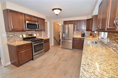 Check out this AWESOME updated maple kitchen with 