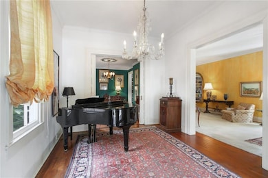 Entrance foyer opens to the living room and dining