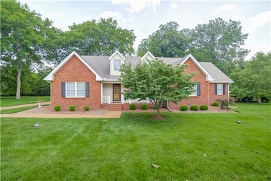 This all brick home sits on a level 1.36 acres and has a thick row of trees in the back for complete privacy!