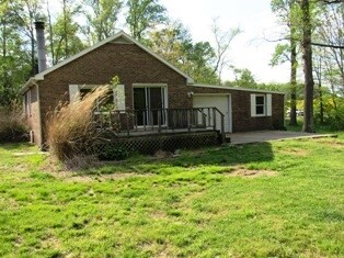 garage on right, deck off kitchen, family room