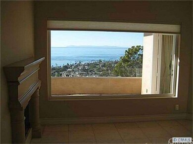 Dining Room with fireplace and Laguna Village view