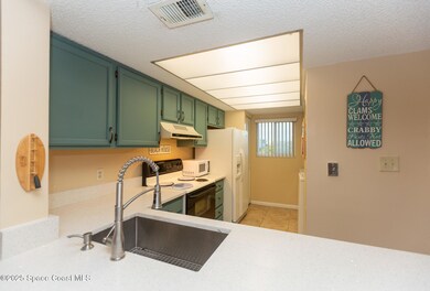 1595 N Atlantic Ave unit 305, Cocoa Beach, FL 32931 - photo 4