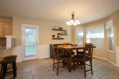 Open Dining with bay window.