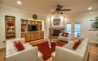 Hardwood and Built In Cabinetry In Family Room