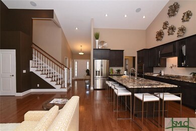 View of amazing kitchen, large foyer and stairway 