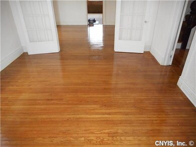 Living Room Newly finished hardwood floors through