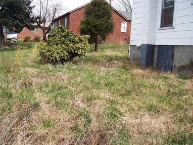 Looking from Back of House next door towards lot