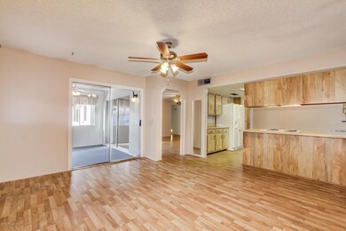 Family Room to AZ Rm adjacent Kitchen