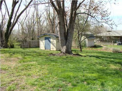 Backyard view with storage shed