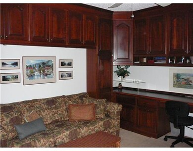 Other. Custom wood cabinet in guest bathroom