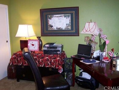 One of the upstairs bedrooms used as an office.