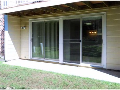 Exterior Back - Private Patio with double sliding 
