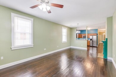 Refinished hardwood flooring.