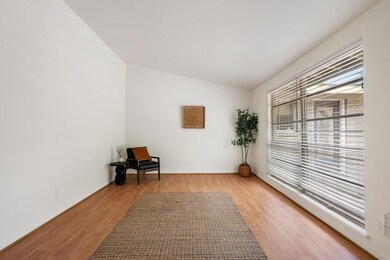 Unfurnished room with baseboards and wood finishe