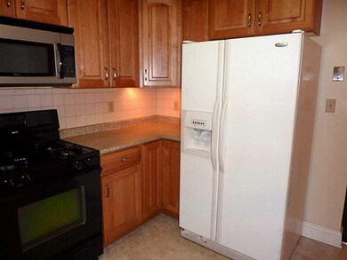 Kitchen. View of kitchen with the included refirge