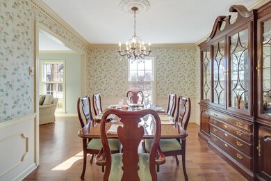 The dining room is nestled between the kitchen and