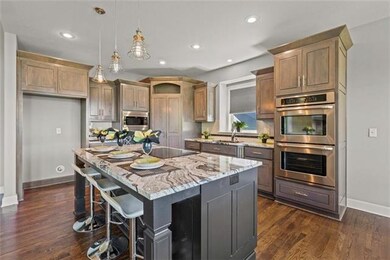 GORGEOUS granite countertop/island, double ovens, 