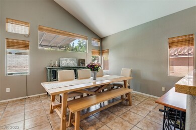 Spacious Dinning Room Vaulted ceilings view of bac