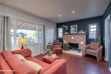 Living Room w/ Wood Burning Fireplace