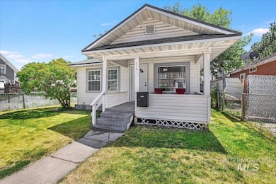 Shotgun-style home with a porch