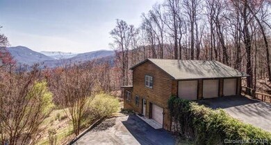Second structure offers views, 4 garages and addit