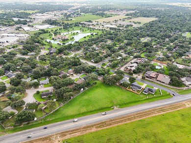 1.6 acre lot off West Loop (FM 2765)