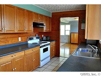 Kitchen. Looking south into the Dining Room from t