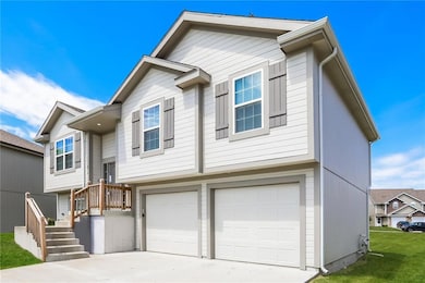 210 Elissa Dr, Raymore, MO 64083 - photo 2