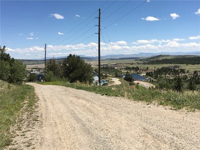 view from road at top of lot looking south over th