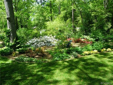 Another view of rear yard in spring