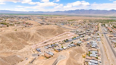 Aerial view of property's location with a mountain