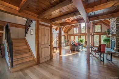 Open floorpan in main living space.  Floors are an