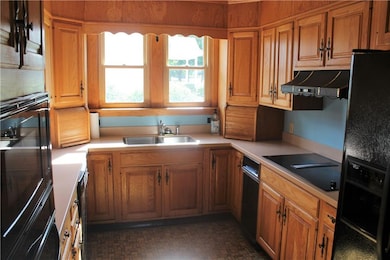 Kitchen with solid surface counters and ample cabi