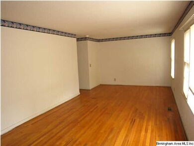 BIG living room and dining room with gleaming hard