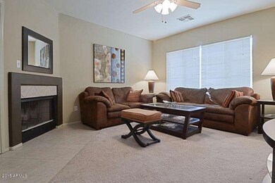 Living room with wood burning fireplace