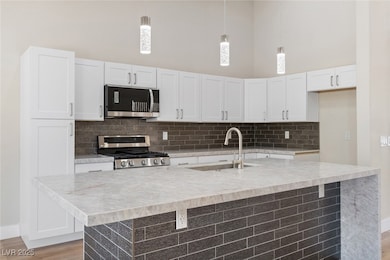 Kitchen featuring stainless steel appliances, a to