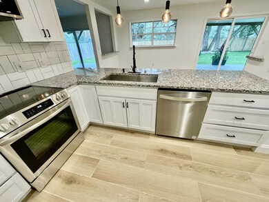 Kitchen Looking to Back Yard