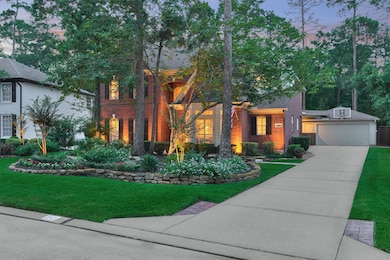 Prestine two-story brick home with a well-manicure