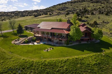 South elevation. Fully irrigated yard, wrap-around