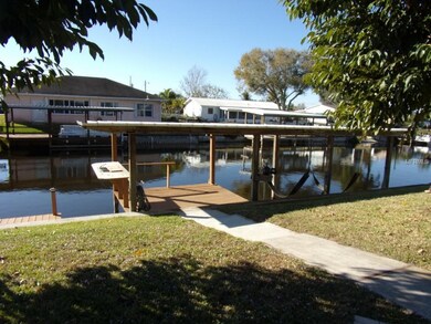BOATHOUSE WITH LIFT  DOCK