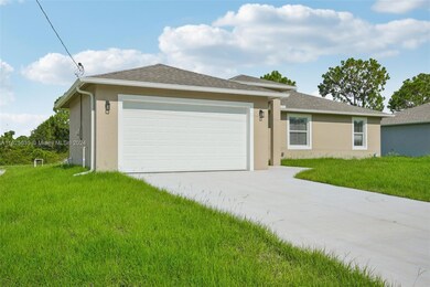 1016 Genoa Ave S, Lehigh Acres, FL 33974 - photo 2