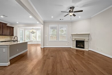 The living area is a spacious open-concept with wa