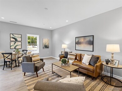Living room with luxury planked vinyl flooring.